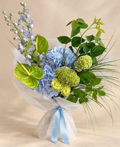 Blue Hydrangeas, Delphiniums, Anthuriums and Green Viburnum